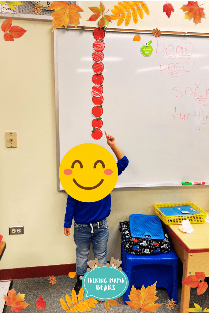 stack apples on top of your head to practice sequencing and counting while reading 10 Apples Up On Top